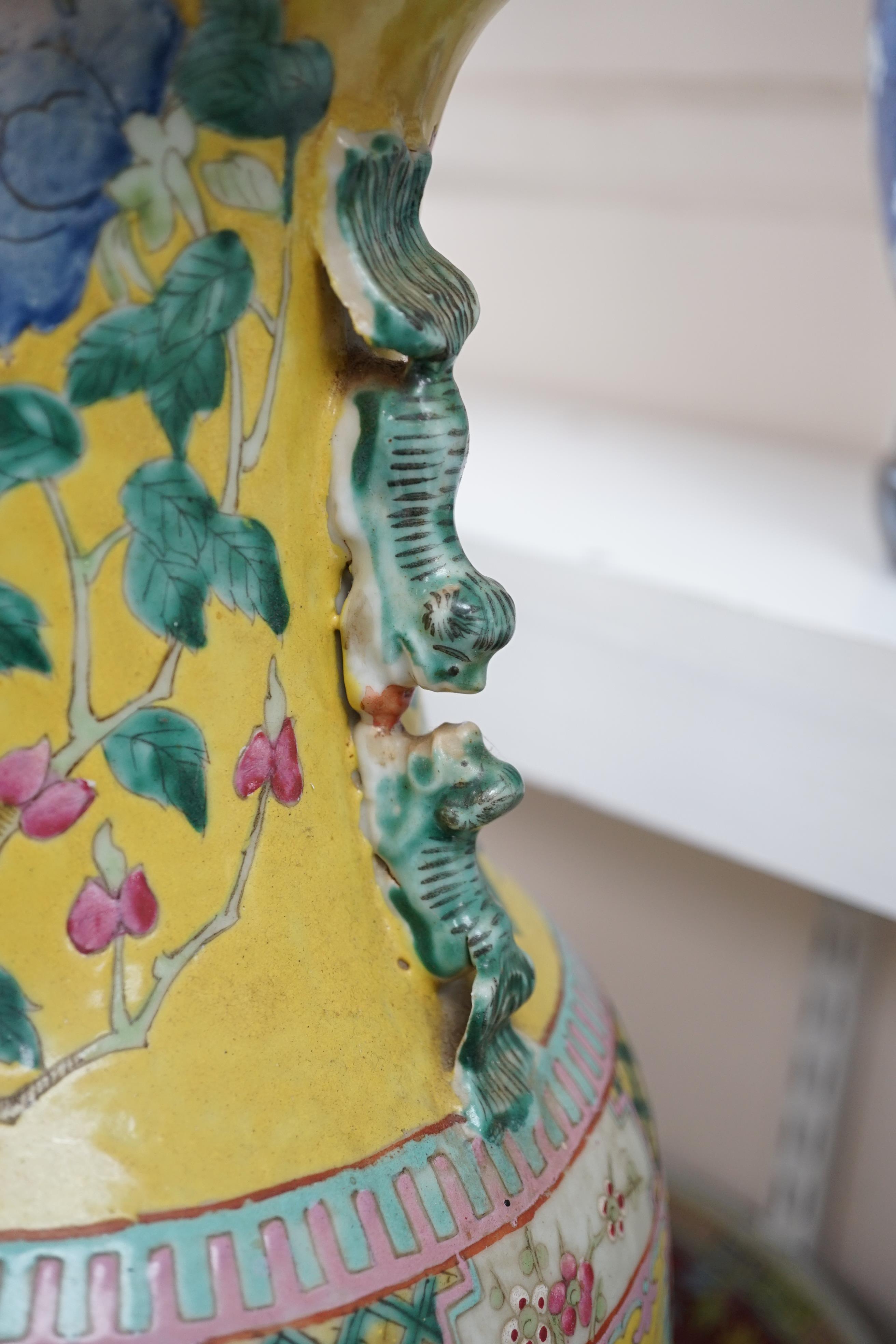 A tall Chinese Straits yellow ground ‘dragon’ vase, 19th century, rim chips